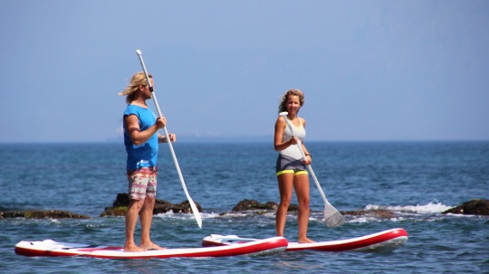 padelsurf padelsurfing tarifa pareja deporte playa